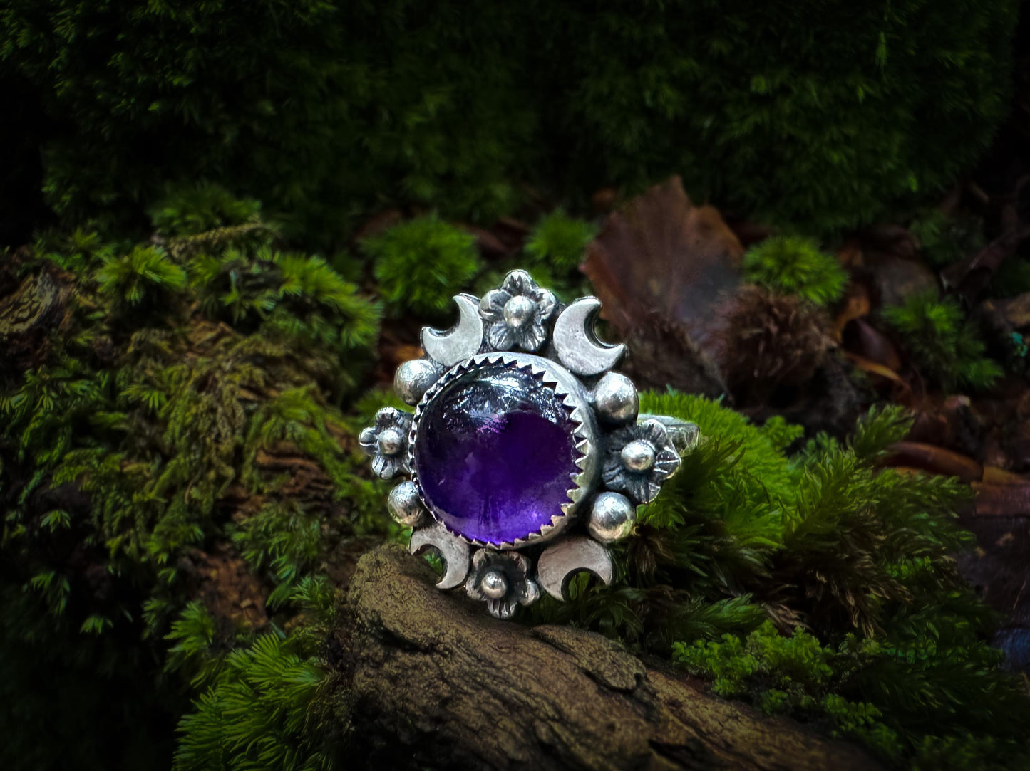 Size 7 handmade sterling silver ring with a round amethyst cabochon and boho-inspired design