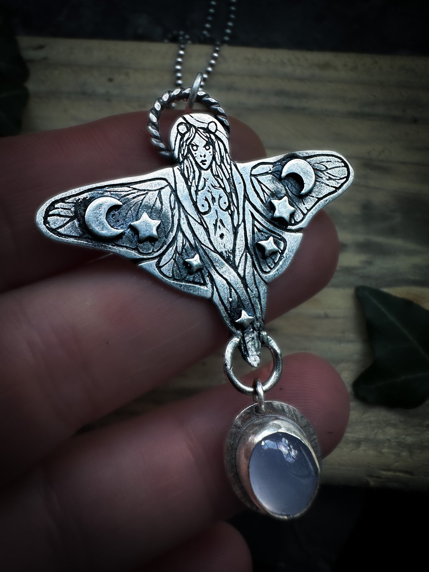 Faerie pendant with pale purple chalcedony stone and celestial details. Inspired by The Fair Folk, by Silver Labyrinth Jewelry 