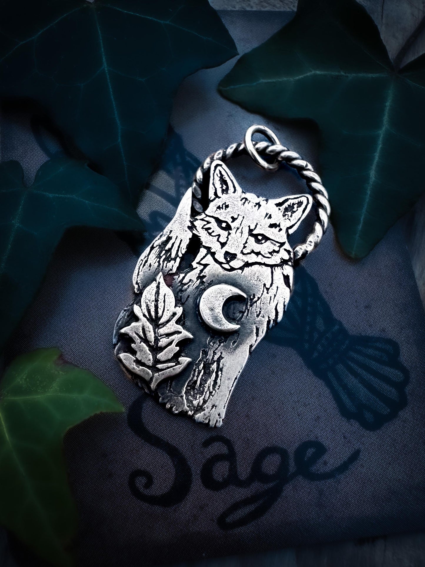 Nature-inspired fox necklace, crafted in sterling silver with intricate details