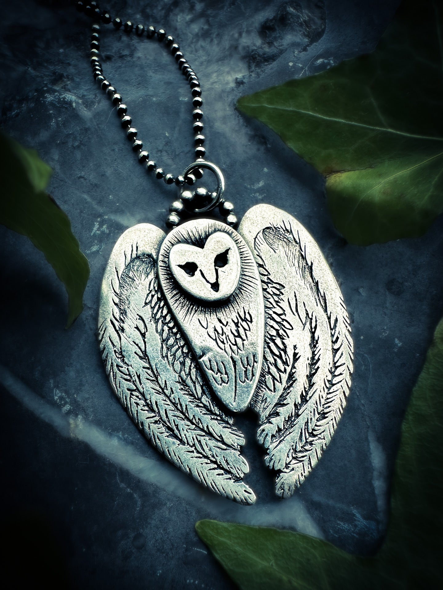 Shamanic-inspired Barn Owl necklace with sterling silver craftsmanship