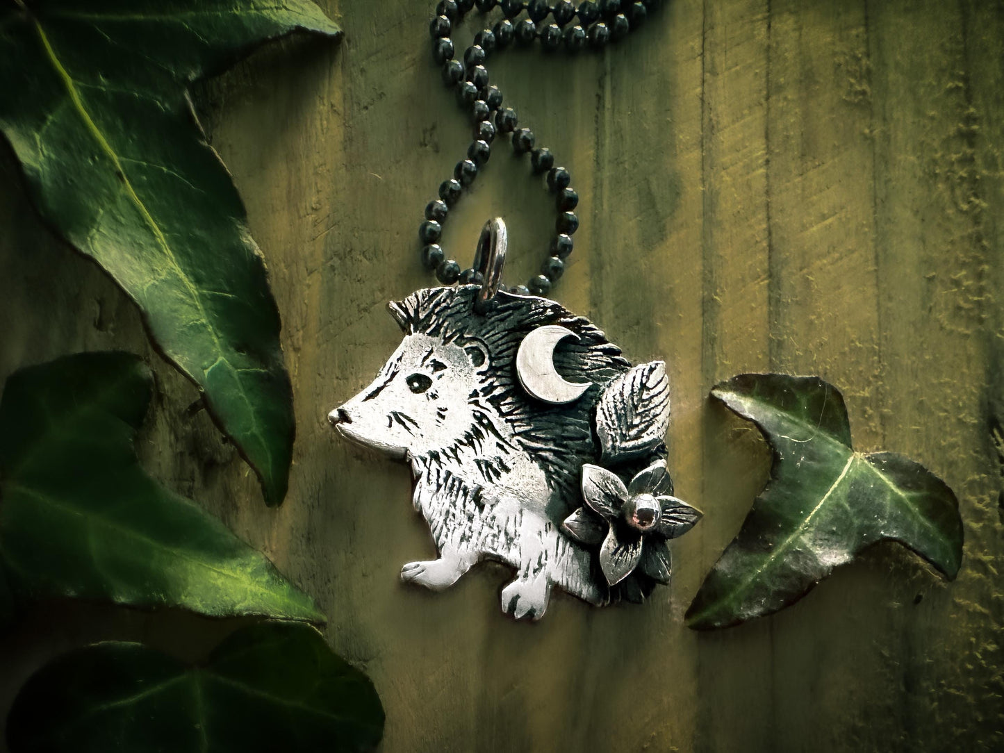 Celebrate nature with this beautifully detail little hedgehog charm. Handmade by Silver Labyrinth Jewelry