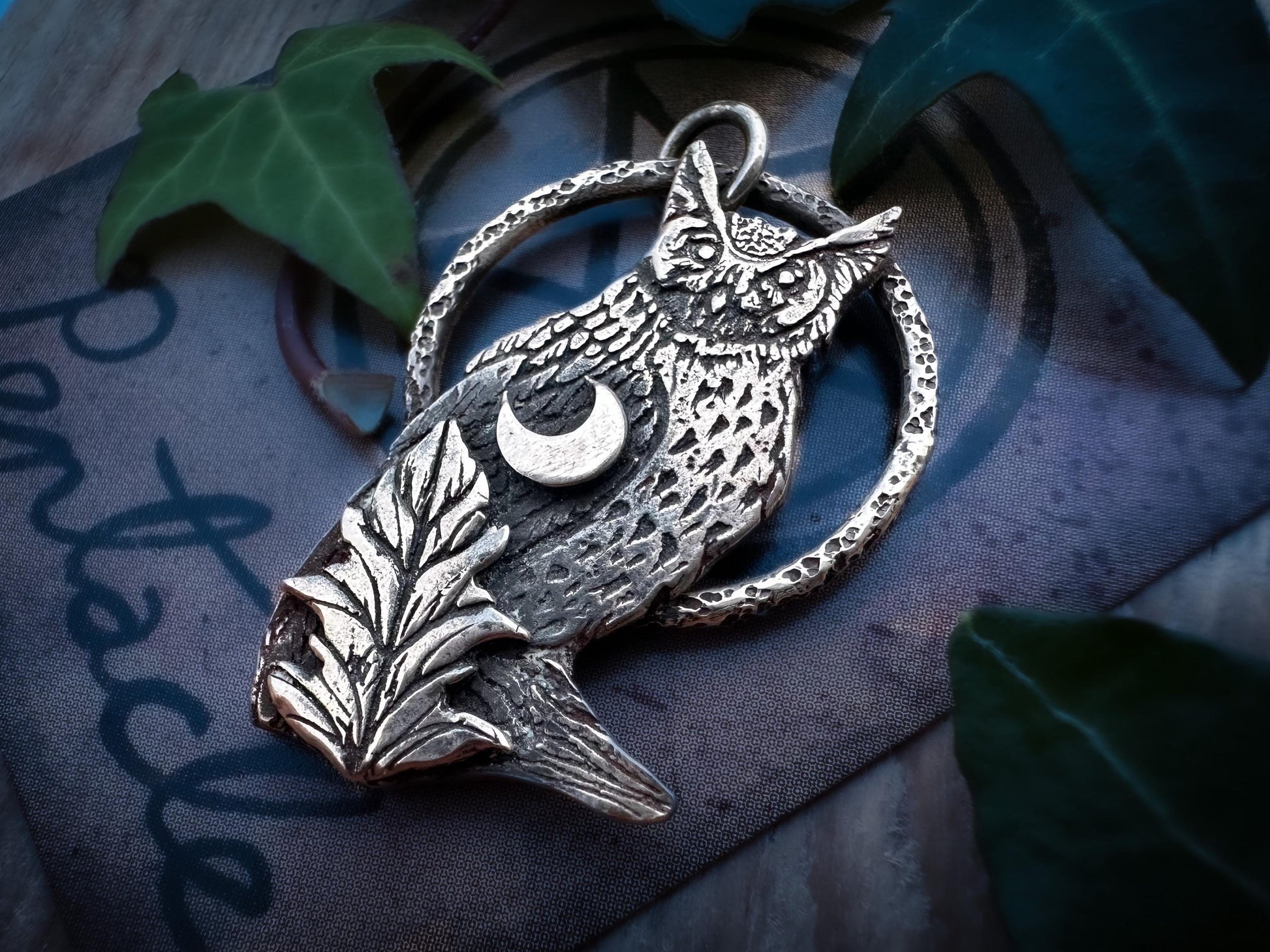 Horned Owl Charm, with beautiful details, crescent moon and leaf motif. Handmade in sterling silver.