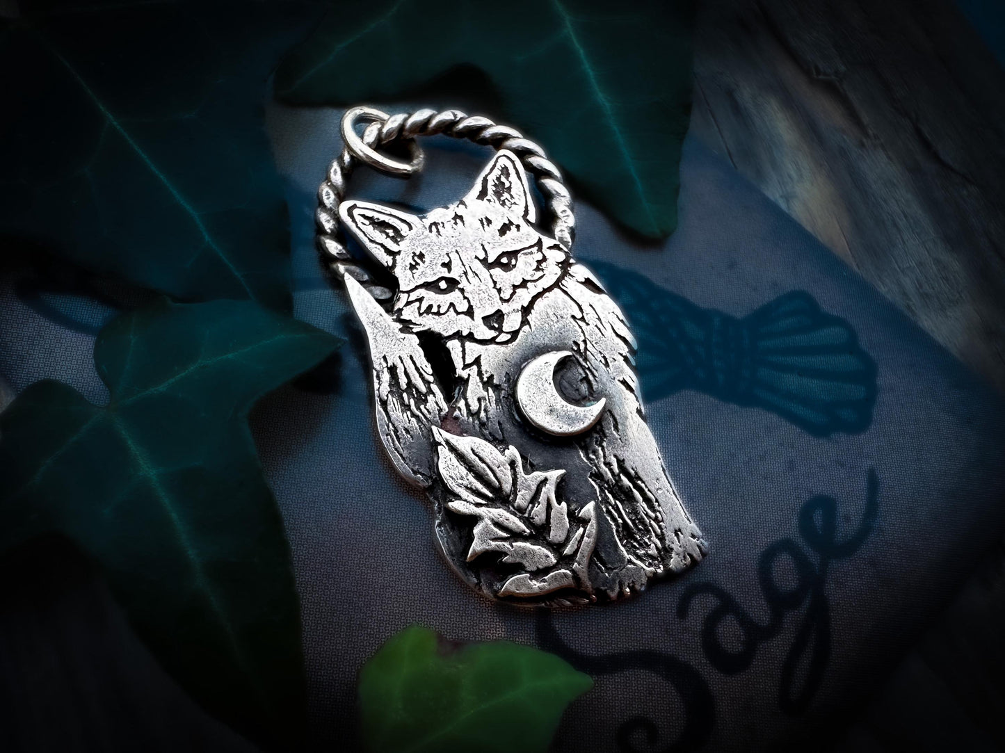 A little woodland fox with crescent moon and leaf. Handmade in sterling silver. Fine details, patina, polished. From The Little Familiars Collection, Jen Smith, Silver Labyrinth Jewelry