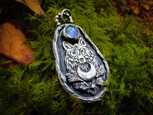 Wild Wolf Pendant with Rainbow Moonstone in Sterling Silver. Designed and handmade by Jen Smith silverlabyrinthjewelry.com